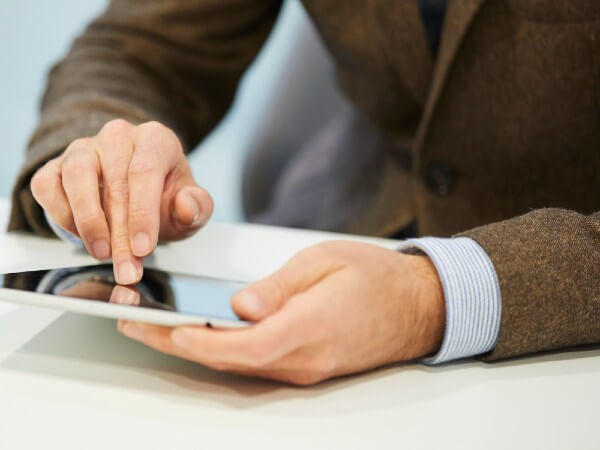 Man holding tablet